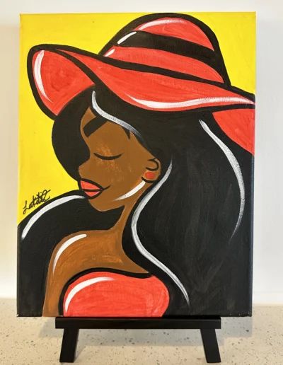 a presketched canvas for the C3 wine painting experience in Spanish Fort displaying a canvas with a beautiful lady with big hair a tube top and a hat
